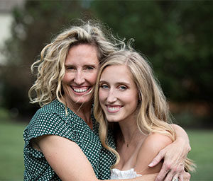 Jeremy Didier with her arms wrapped around her daughter, Sophie. Webinar: Tourette and ADHD.